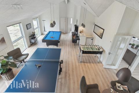 Aktivitetsrum i luksushus nr. 659 med 8 soveværelser og plads til 20 personer.