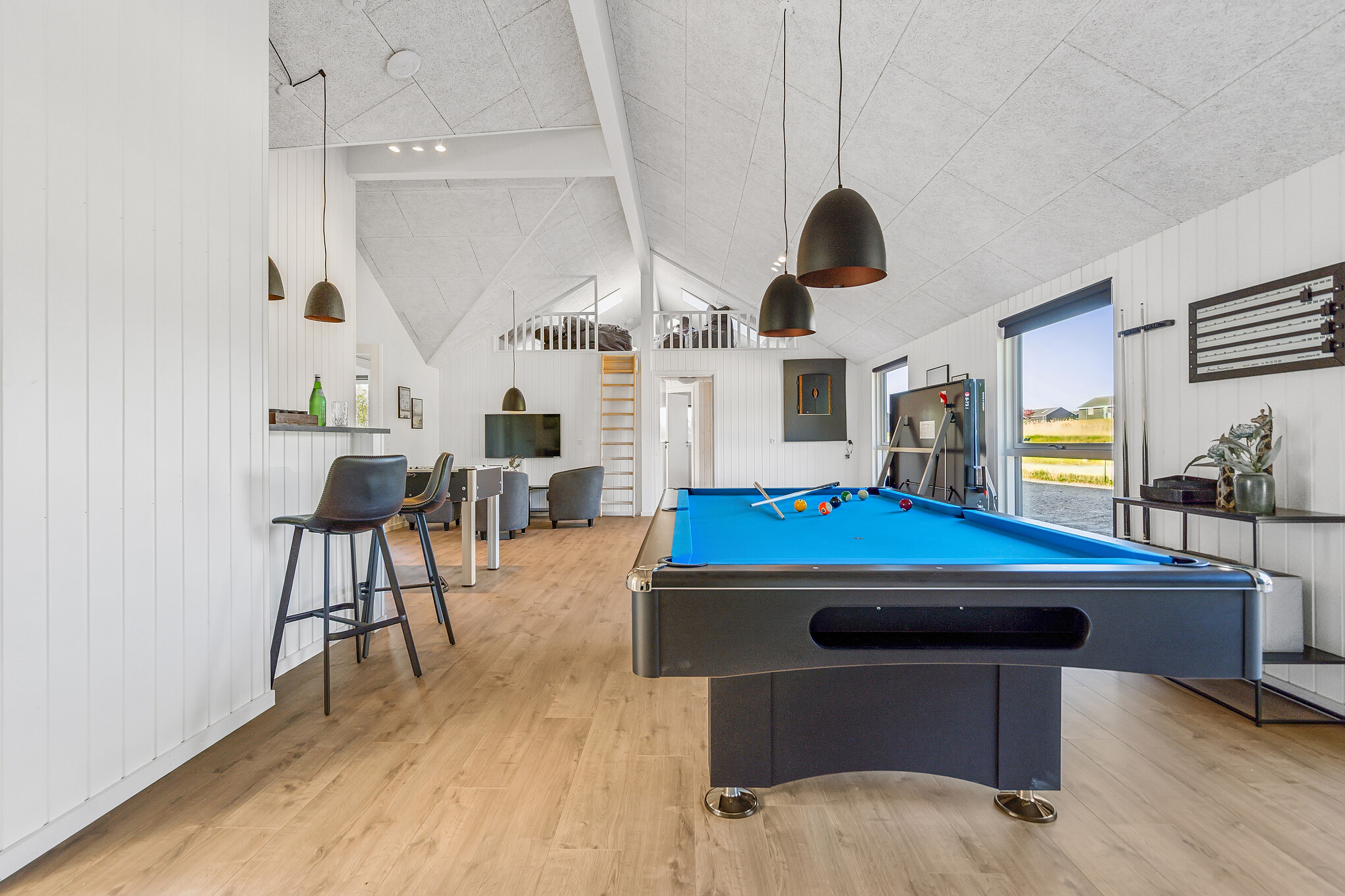 Ud over de mange timer, man kan bruge i husets pool-afdeling, så byder luksushus 657 også på billard/bordtennis og dart
