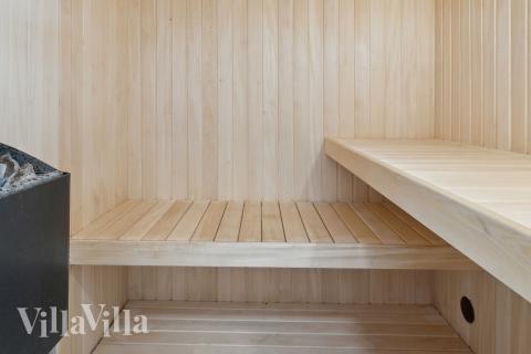 Nyd varmen i saunaen i luksushus nr. 689 til 10 personer