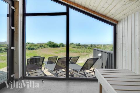 Nyd varmen i saunaen i luksushus nr. 909 til 12 personer