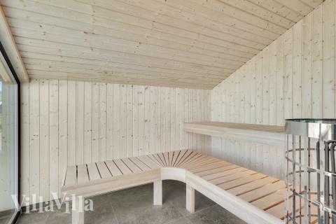 Luksushus nr. 909 er blandt andet udstyrret med en dejlig sauna.