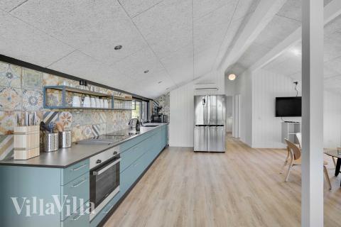 Køkkenet i luksushus nr. 909 er udstyrret, så I let kan lave mad til 12 personer.