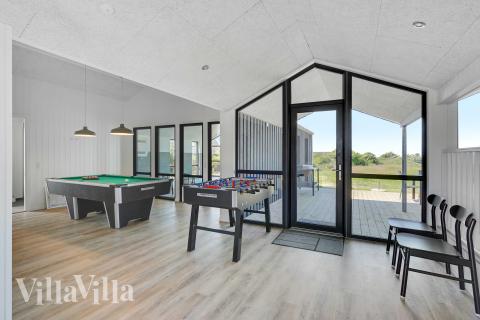 Ud over de mange timer, man kan bruge i husets pool-afdeling, så byder luksushus 909 også på billard/bordtennis og dart