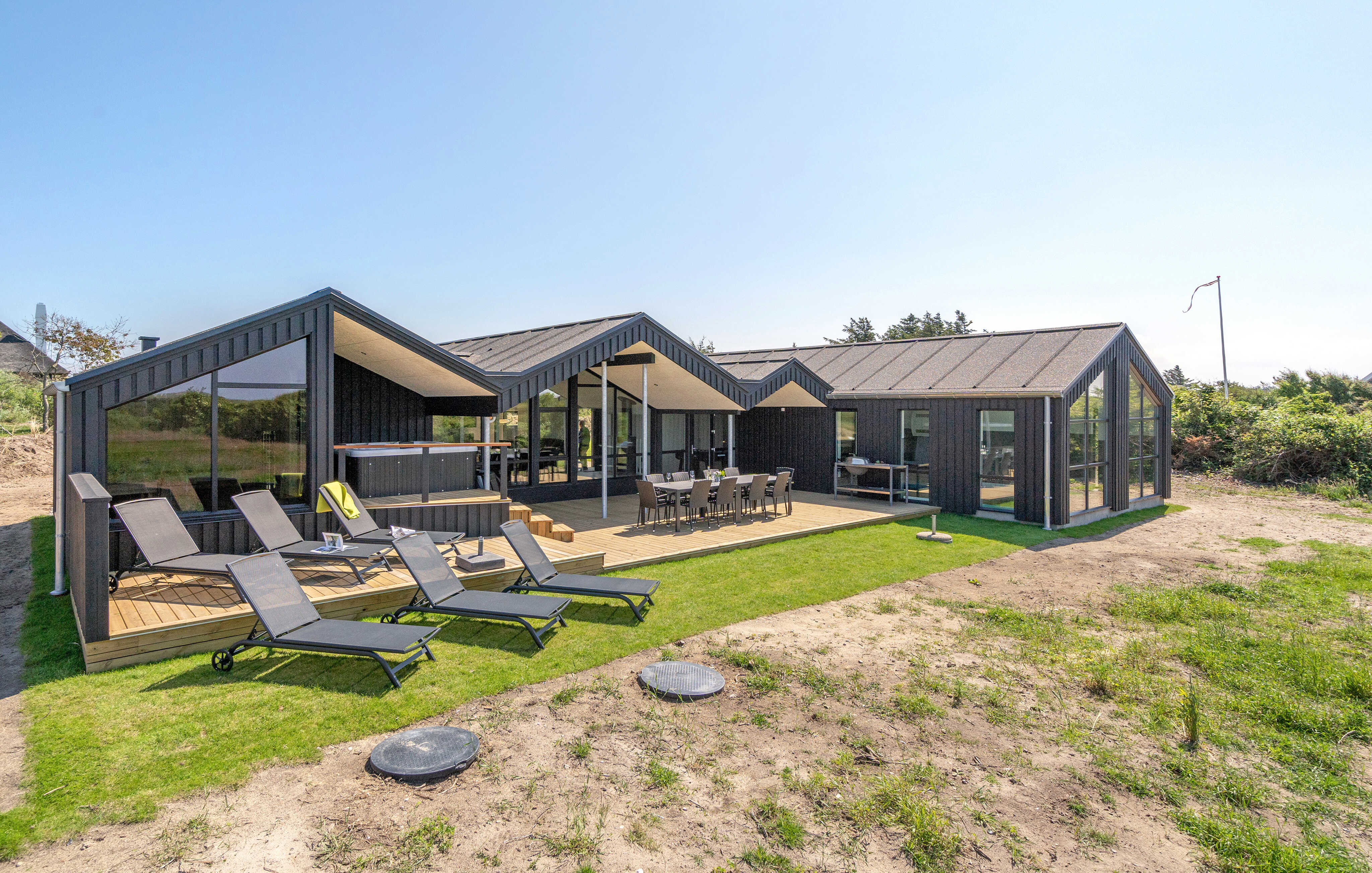 Dette skønne poolhus nr. 909 med plads til 12 personer ligger i Nordjylland