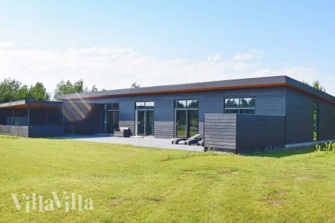 Dette skønne spahus nr. 908 med plads til 14 personer ligger i Lolland/Falster/Møn