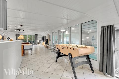 Ud over de mange timer, man kan bruge i husets pool-afdeling, så byder luksushus 552 også på billard/bordtennis og dart