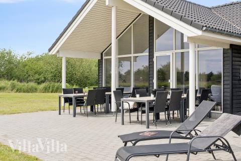 Nyd en grillaften på terrassen i luksushus nr. 459 i Lolland/Falster/Møn