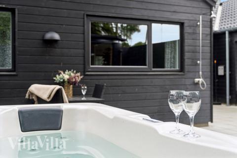 Nyd varmen i spaen i luksushus nr. 584 i Nordsjælland