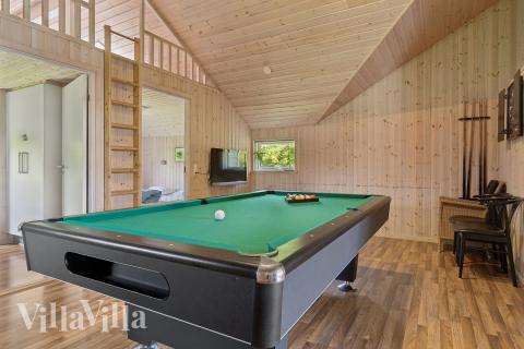 Ud over de mange timer, man kan bruge i husets pool-afdeling, så byder luksushus 268 også på billard/bordtennis og dart