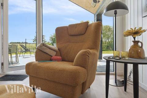 Opholdsrum med plads til 18 i luksushus nr. 667.