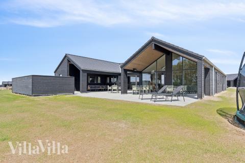 Dette skønne poolhus nr. 667 med plads til 18 personer ligger i Fyn og øer