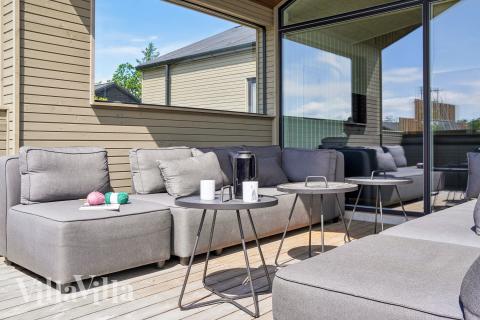 Nyd en grillaften på terrassen i luksushus nr. 619 i Nordjylland