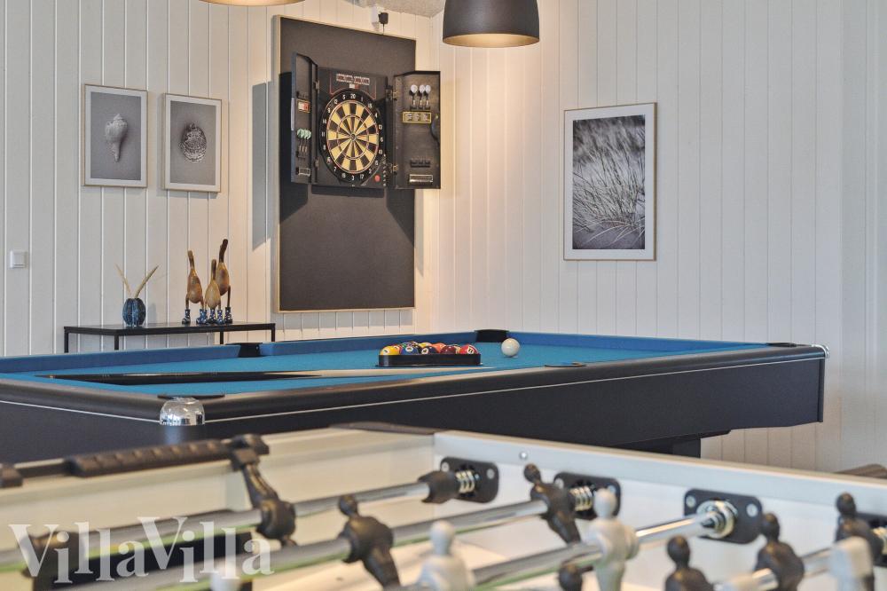 Ud over de mange timer, man kan bruge i husets pool-afdeling, så byder luksushus 673 også på billard/bordtennis og dart