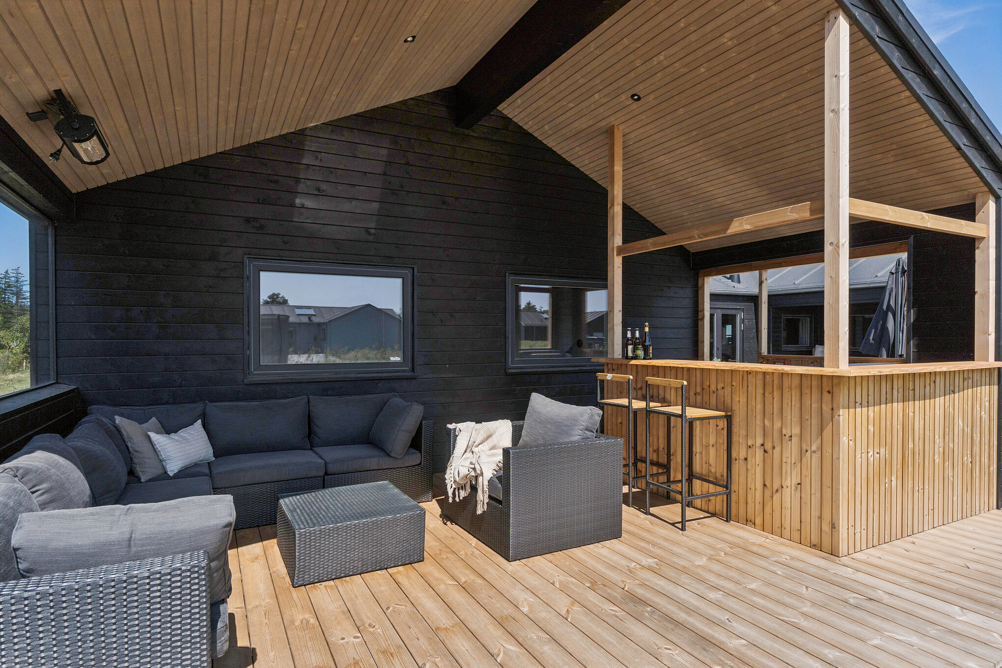 Nyd en grillaften på terrassen i luksushus nr. 656 i Nordjylland