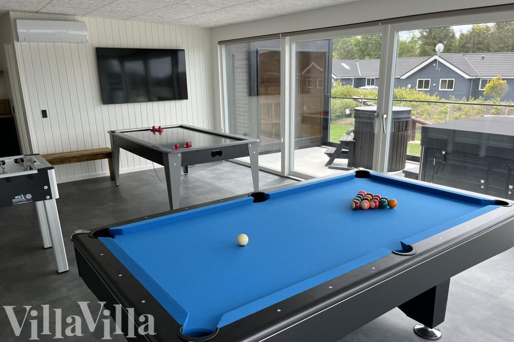Ud over de mange timer, man kan bruge i husets pool-afdeling, så byder luksushus 686 også på billard/bordtennis og dart