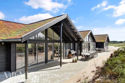 Luksushus nr. 383 har en dejlig terrasse med gode havemøbler til 18 personer.