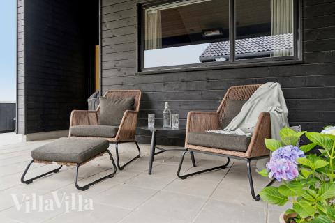 Nyd en grillaften på terrassen i luksushus nr. 668 i Fyn og øer