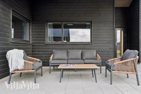 Nyd en grillaften på terrassen i luksushus nr. 695 i Fyn og øer