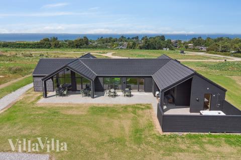 Dette skønne poolhus nr. 695 med plads til 20 personer ligger i Fyn og øer