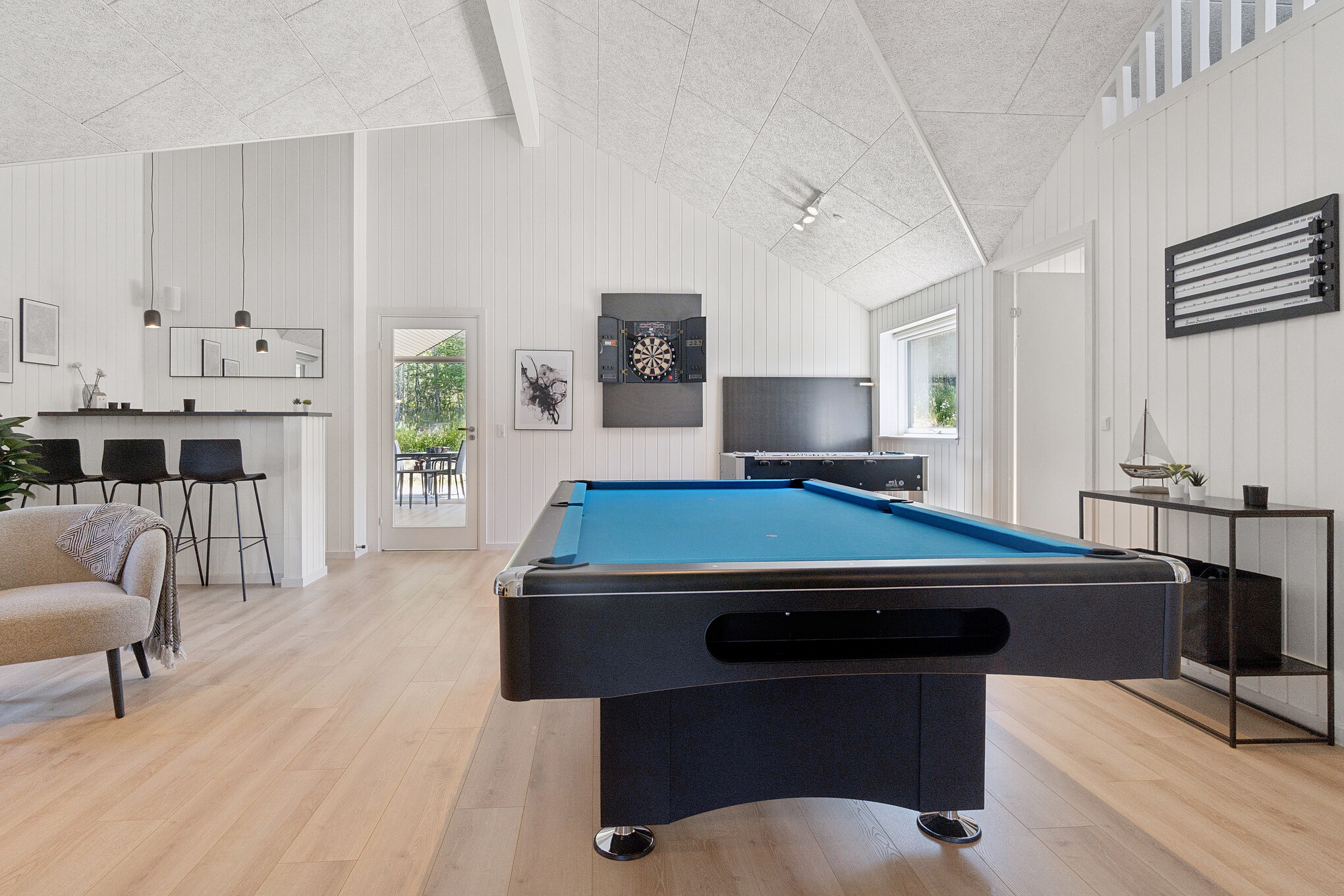Ud over de mange timer, man kan bruge i husets pool-afdeling, så byder luksushus 811 også på billard/bordtennis og dart