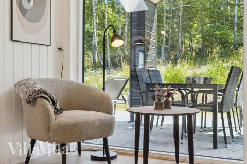 Opholdsrum med plads til 16 i luksushus nr. 811.