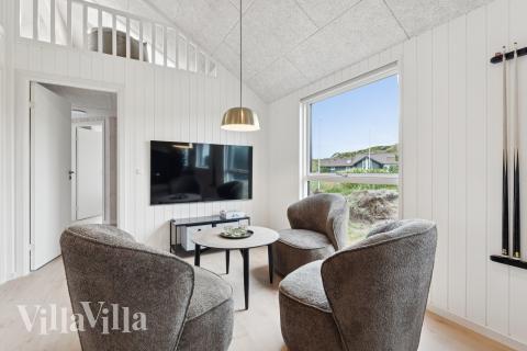 Dyst i sommerhusets aktivitetsrum, når I besøger luksushus nr. 672 i Vestjylland.