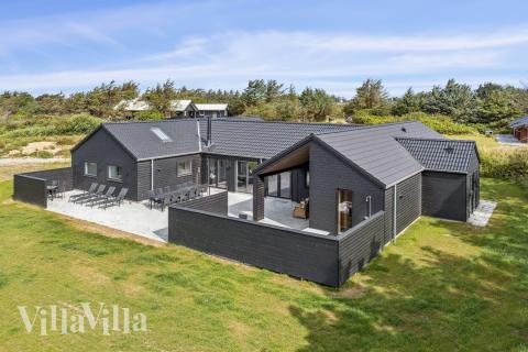 Flot sommerhus nr. 658 med god plads til op til 20 personer