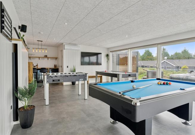 Ud over de mange timer, man kan bruge i husets pool-afdeling, så byder luksushus 686 også på billard/bordtennis og dart