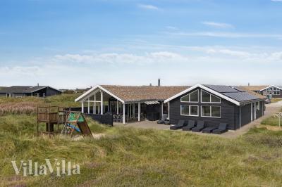 Dette skønne poolhus nr. 292 med plads til 18 personer ligger i Vestjylland
