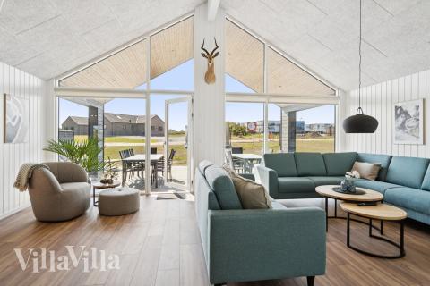 Sofahjørnet i luksushus 696 i Fyn og øer.