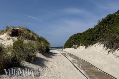 Stranden nær luksushus nr. 905.