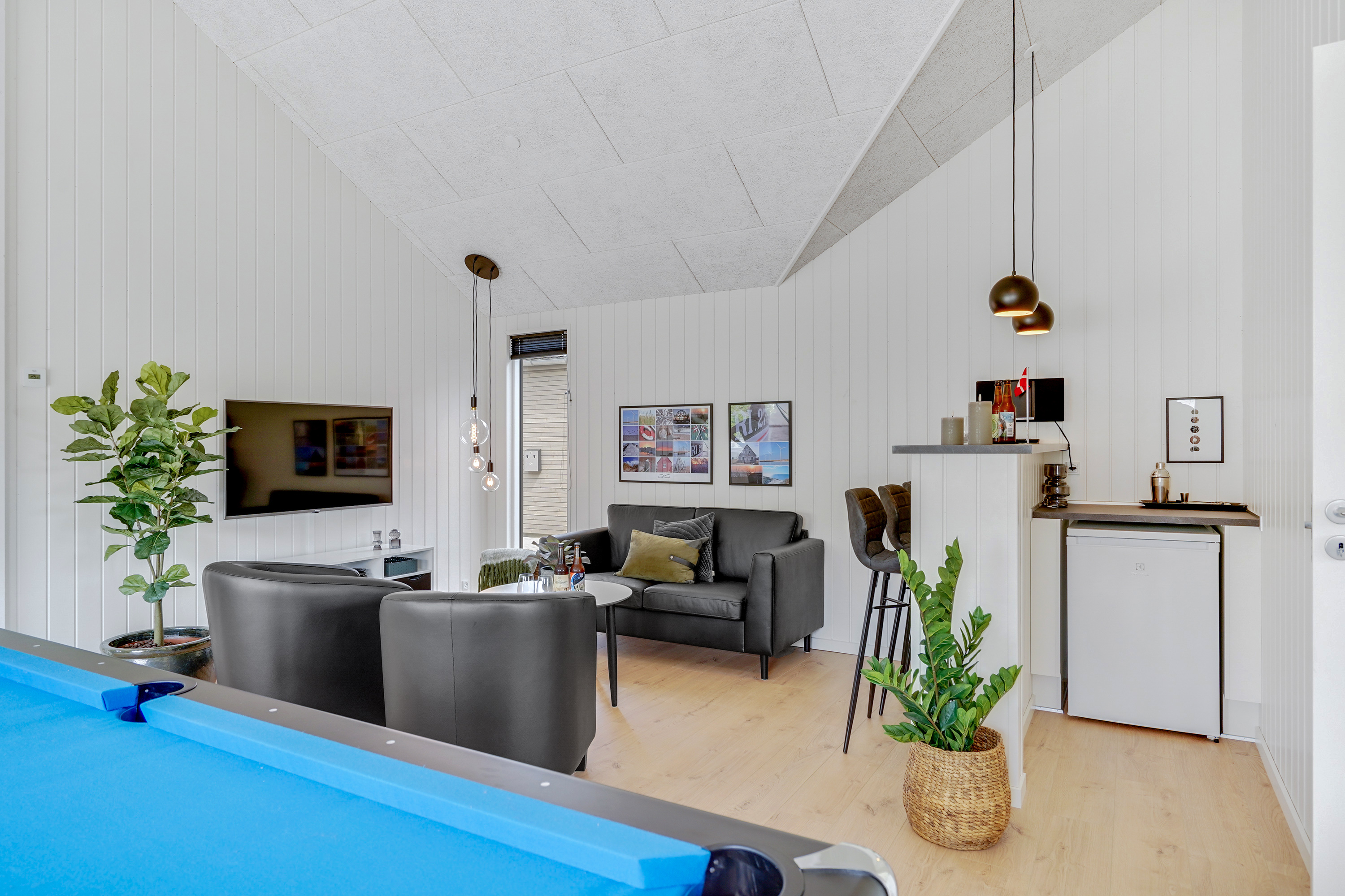 Dyst i sommerhusets aktivitetsrum, når I besøger luksushus nr. 900 i Vestjylland.