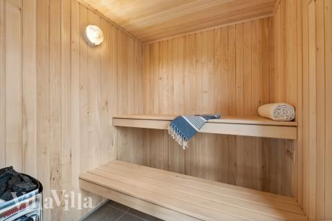 Nyd varmen i saunaen i luksushus nr. 907 til 18 personer