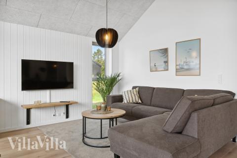 Sofahjørnet i luksushus 906 i Fyn og øer.