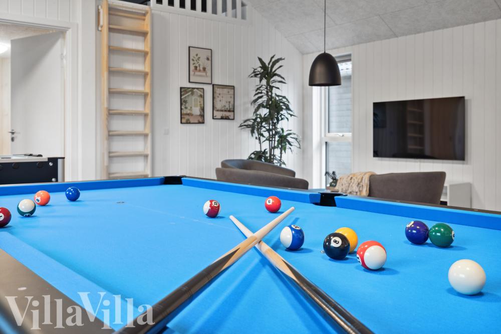 Ud over de mange timer, man kan bruge i husets pool-afdeling, så byder luksushus 906 også på billard/bordtennis og dart