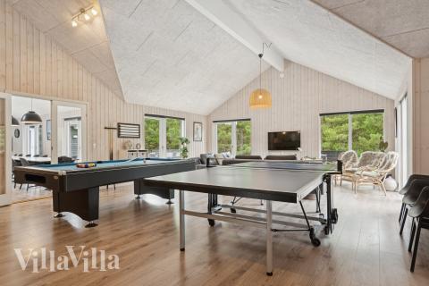 Aktivitetsrum i luksushus nr. 387 med 9 soveværelser og plads til 24 personer.