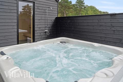 Nyd varmen i spaen i luksushus nr. 697 i Lolland/Falster/Møn