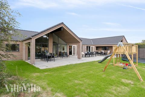 Flot sommerhus nr. 699 med god plads til op til 26 personer