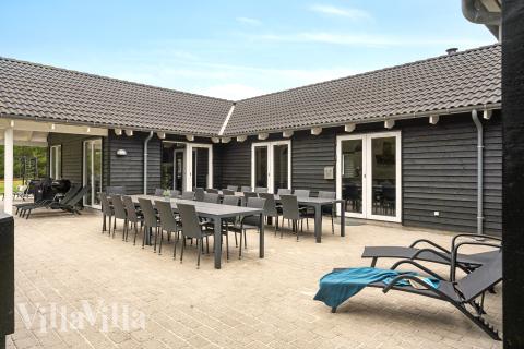 Luksushus nr. 387 har en dejlig terrasse med gode havemøbler til 24 personer.