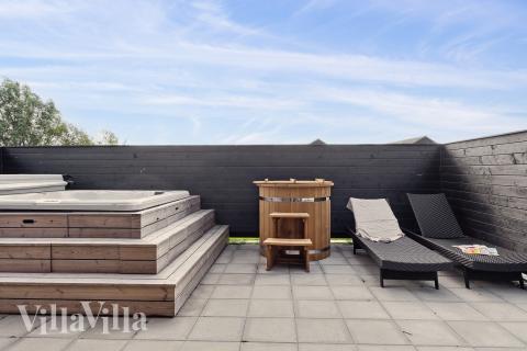 Nyd varmen i spaen i luksushus nr. 655 i Fyn og øer