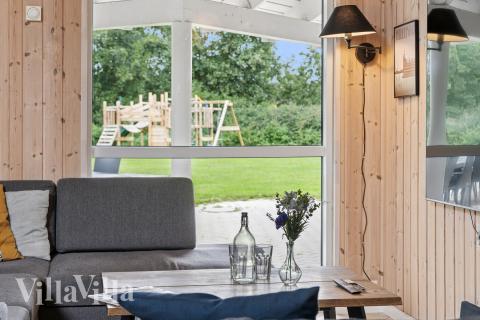 Sofaen i luksushus 222 i Lolland/Falster/Møn indbyder til brætspil eller at se en film sammen.