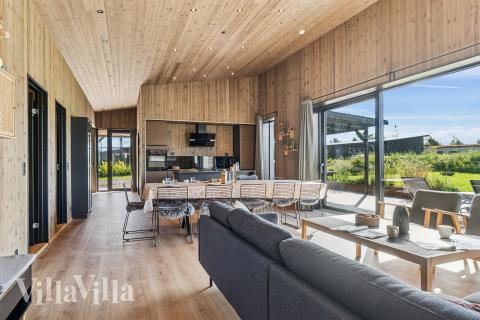 Opholdsrum med plads til 12 i luksushus nr. 925.