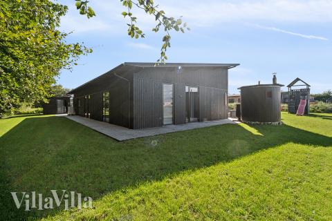 Dette skønne spahus nr. 925 med plads til 12 personer ligger i Limfjorden