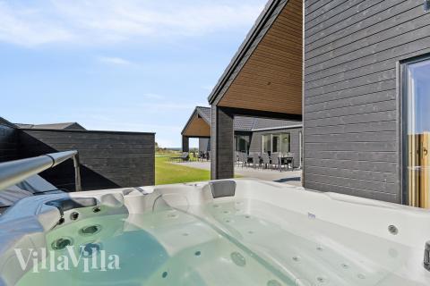 Nyd varmen i spaen i luksushus nr. 673 i Fyn og øer