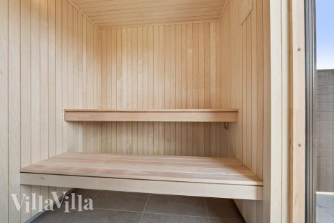 Nyd varmen i saunaen i luksushus nr. 698 til 14 personer