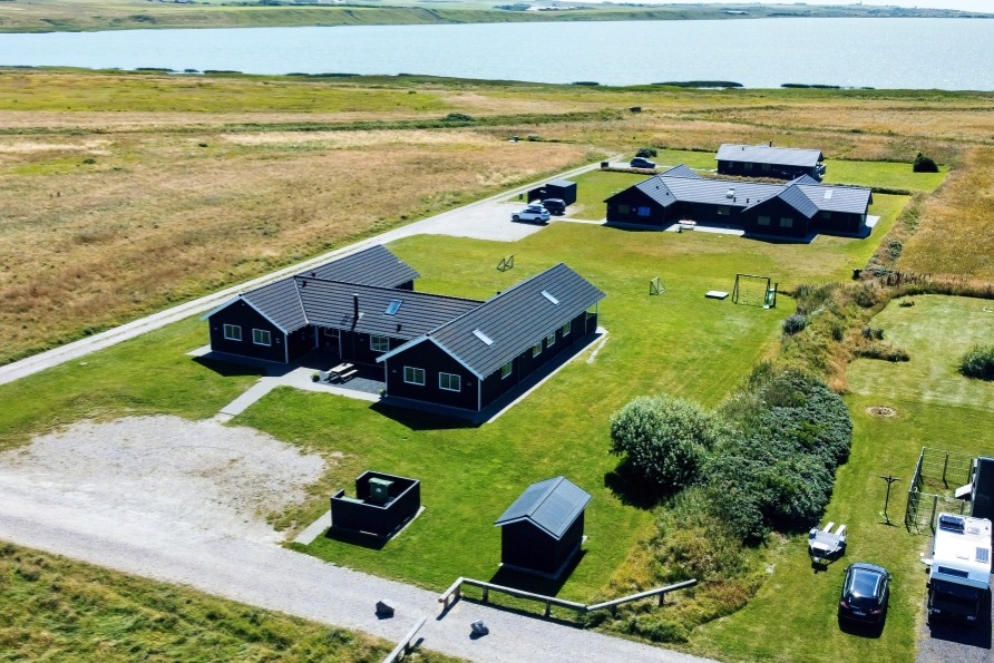 Dette skønne poolhus nr. 293 med plads til 22 personer ligger i Vestjylland
