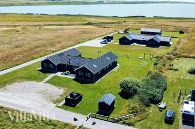 Dette skønne poolhus nr. 293 med plads til 22 personer ligger i Vestjylland