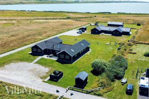 Dette skønne poolhus nr. 293 med plads til 22 personer ligger i Vestjylland