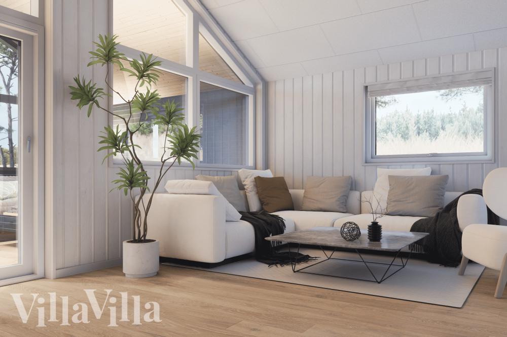 Sofaen i luksushus 919 i Fyn og øer indbyder til brætspil eller at se en film sammen.