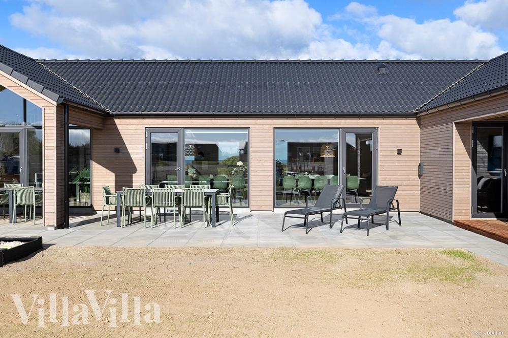 Nyd en grillaften på terrassen i luksushus nr. 901 i Fyn og øer
